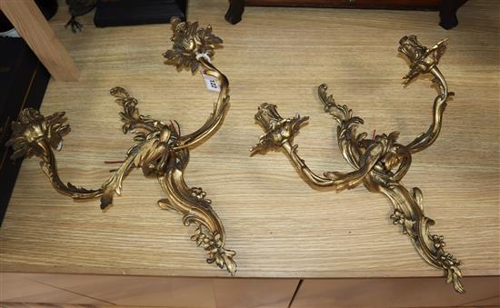 A large pair of rococo style ormolu wall lights height 37cm